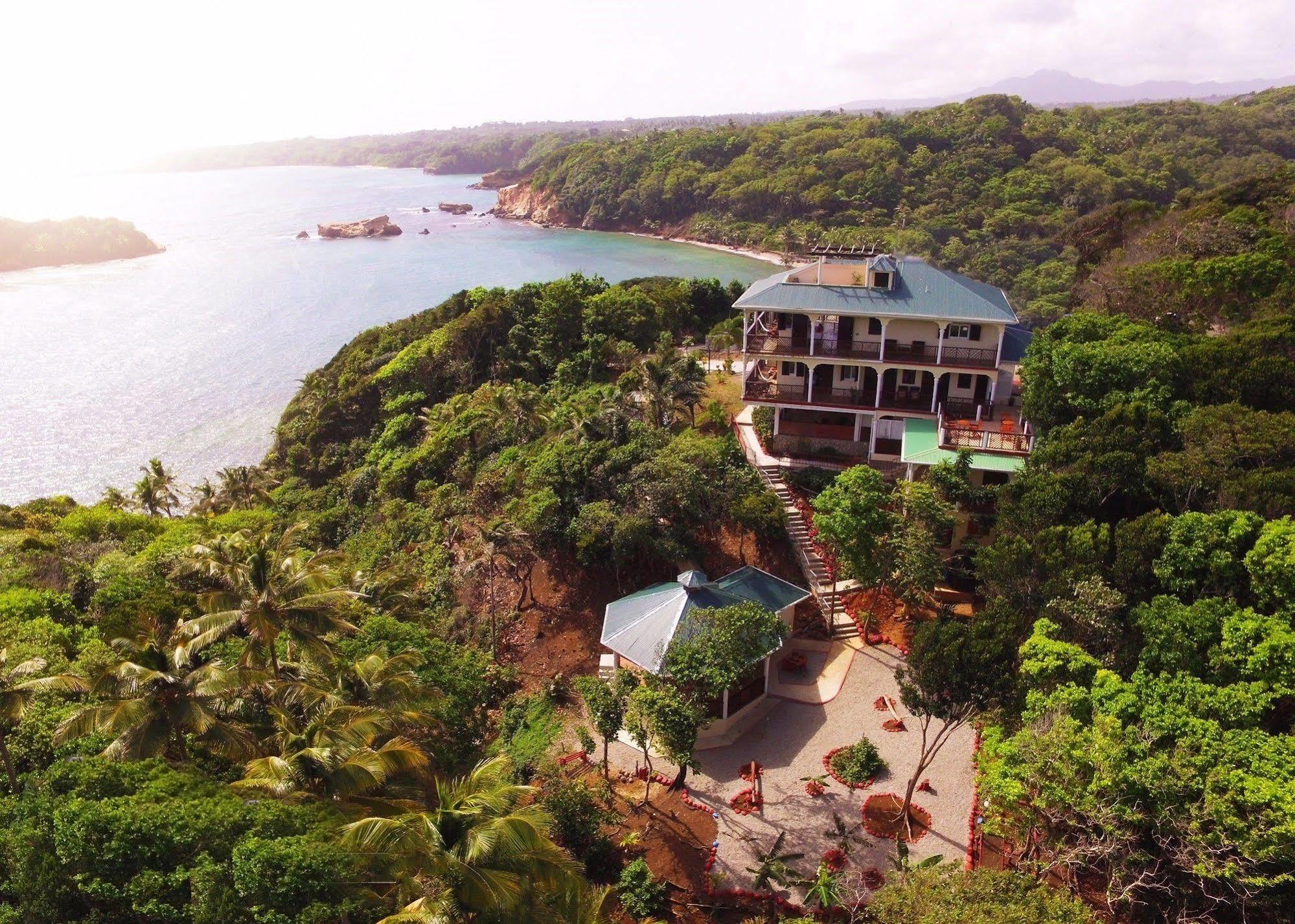 Отель Calibishie Cove Экстерьер фото